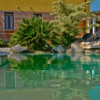 Pishina në Verona, projektuar dhe ndërtuar nga Natural Pool